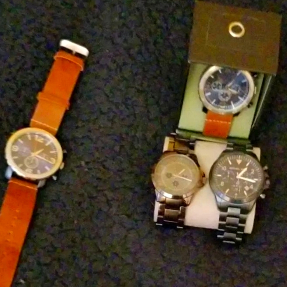 Watches.Burberry/Versace and Michael Kors.and one small gold ladies I'll post tm